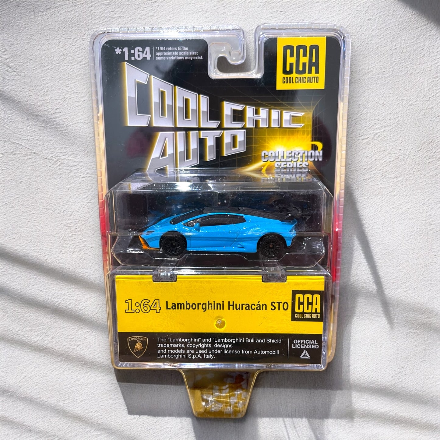 CCA - 1:64 - Premium -Lamborghini Huracan STO -Blue-  Blister Pack (With Stackable Box)